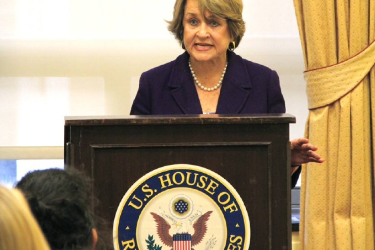 Congresswoman Louise Slaughter standing at a podium