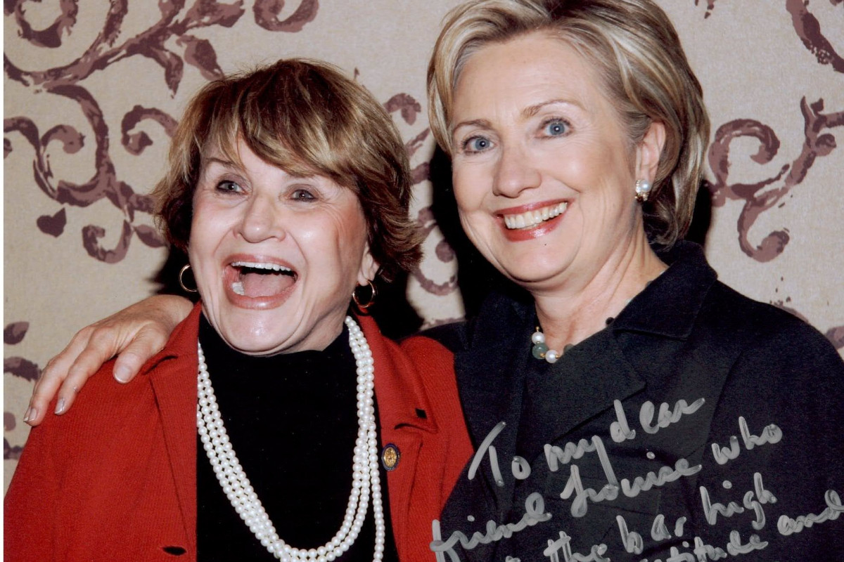 Louise Slaughter with Hilary Clinton posing with large smiles for the camera