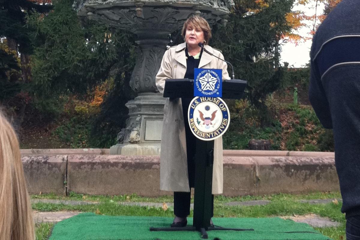 Louise Slaughter speaking at Mt. Hope cemetery in front of the Florentine fountain