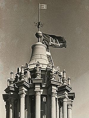 Top of building with a McDonald's flag flying